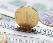 Курс рубля к доллару может вырасти на этой неделе - эксперт
