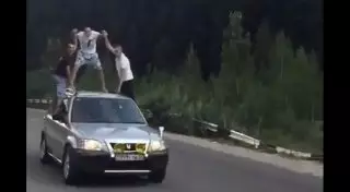 Трое парней прокатились верхом на авто в Алматы