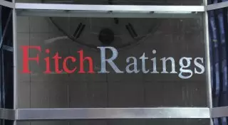 Выгоды от понижения курса тенге могут быть ограниченными - Fitch