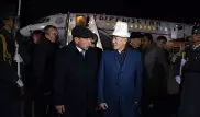 Президент Кыргызстана прилетел в Казахстан в национальном головном уборе