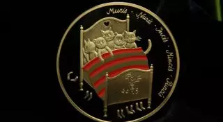 Банк Латвии выпустит коллекционную монету "с котиками"