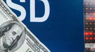 Курс доллара на утренней сессии KASE превысил отметку в 309 тенге