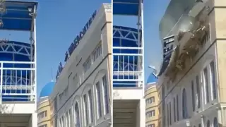 Обрушение крыши вуза ветром попало на видео в Кызылорде