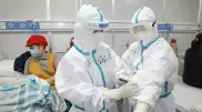 Первой коронавирусом в Китае заболела продавец креветок - СМИ