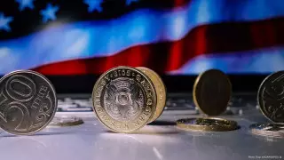 Доллар продают в обменниках по 404 тенге