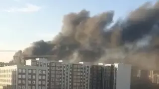 Густой черный дым в новостройке напугал астанчан