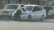 Полицейского протащили на капоте авто в Кызылорде