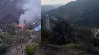 Покидающие Карабах армяне поджигают свои дома