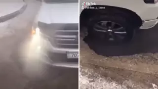 Land Cruiser провалился колесом в асфальт в центре Павлодара