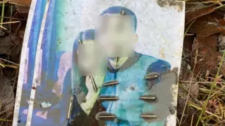 Алматыда белгісіз біреулер қыз бен жігіттің суретін ине тығып, молаға тастаған