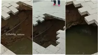 Дыру в тротуаре сняли на видео в Нур-Султане