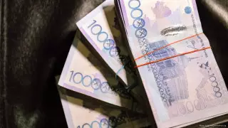 "Служба безопасности банка" вытянула из жительницы СКО 8 миллионов тенге