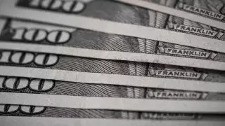 Курс доллара снова снизился