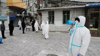 Больным COVID-19 будут платить более 1,5 тысячи долларов в Китае