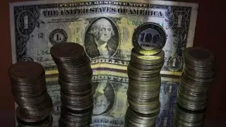 Курс доллара снова снизился