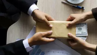 Требовали миллион долларов: Антикор провел спецоперацию