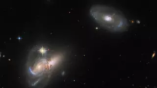 Телескоп Hubble запечатлел трио галактик