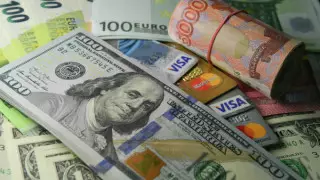 Названы официальные курсы доллара и рубля на 13 сентября