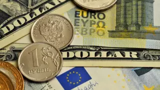 Названы официальные курсы доллара и рубля на 13 октября