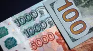 Названы официальные курсы доллара и рубля на выходные