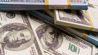 Курс доллара снизился еще на 2,6 тенге