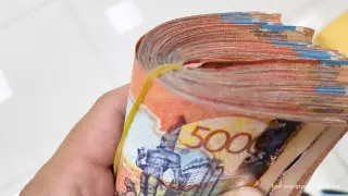 Как решить проблему с кредитами казахстанцев - мнение экономистов