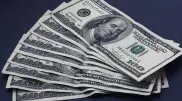 Курс доллара немного вырос на торгах