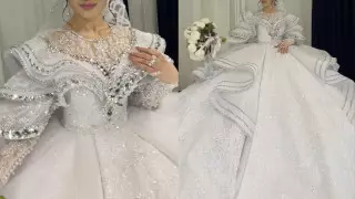 Казахстанка удивила соцсети свадебным платьем весом 50 килограммов