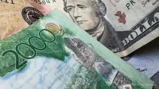 Курс доллара еще немного вырос на торгах