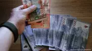 Почти 150 миллионов тенге выманил аферист-помогайка у астанчан
