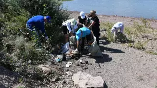 Столичные АНК и НПО провели субботник на берегу водохранилища