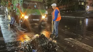 Поваленные деревья и месячная норма осадков: что происходит после потопа в Алматы