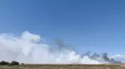 В Актобе второй день не могут потушить пожар на мусорном полигоне