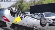 Такси с пассажиром перевернулось на крышу в результате ДТП в Шымкенте