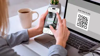 В Halyk запустили оплату через QR-код для онлайн-покупок
