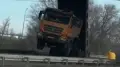 Многотонный грузовик застрял под мостом в Костанае, пострадал водитель